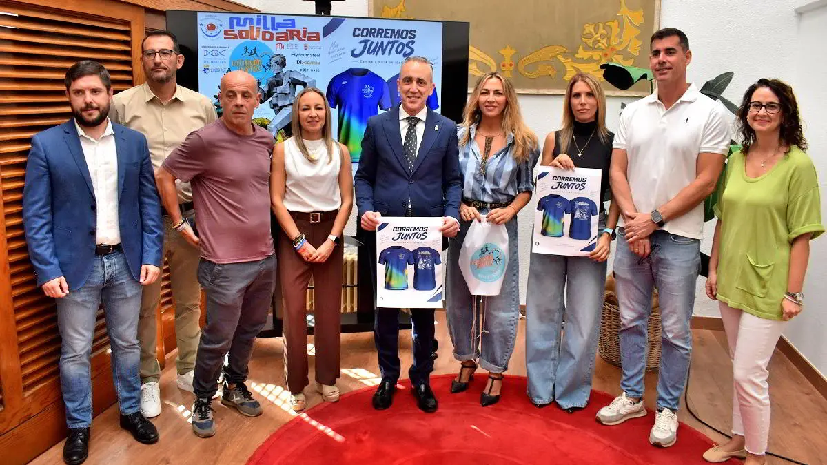 Cartel de la Milla Urbana Solidaria de la Fundación Escobar Camprubí en el Paseo de San Gregorio de Puertollano